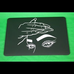 Black MacBook case with vinyl artwork